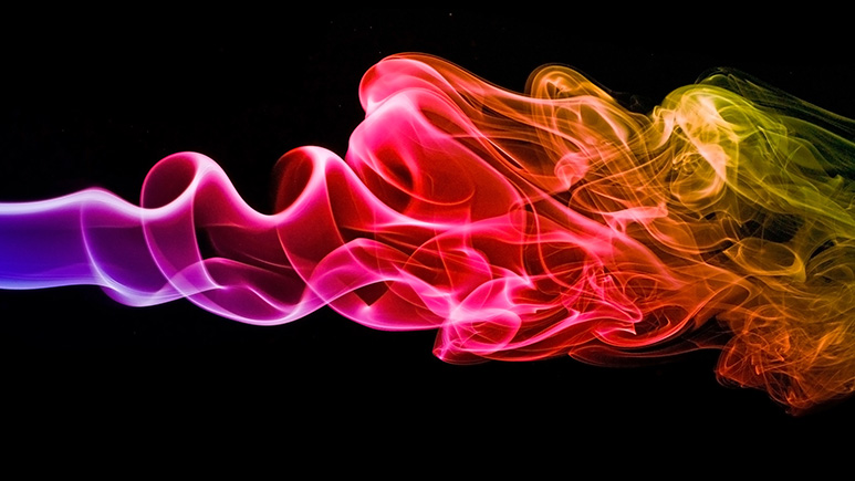 Colorful smoke on black background