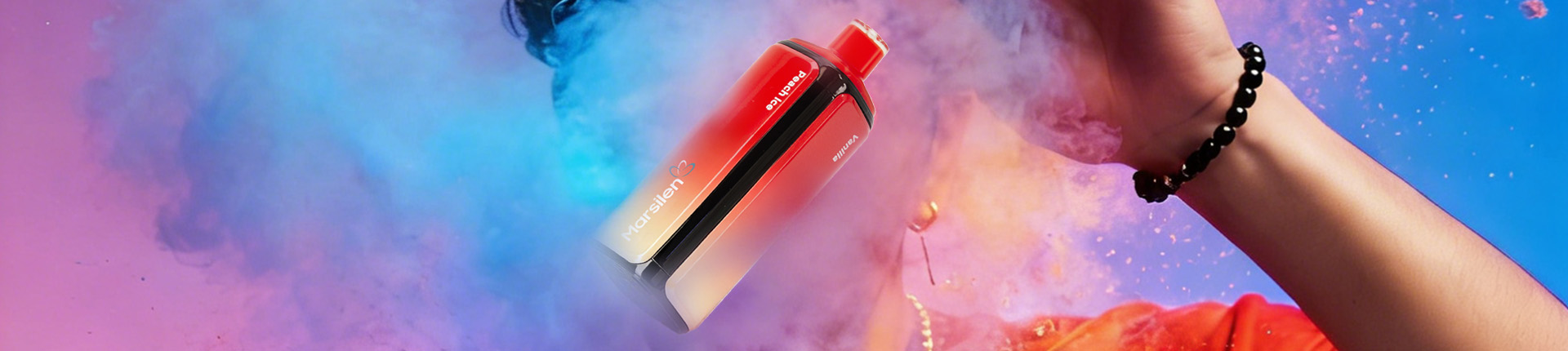 Hand sprays colorful powder with vape